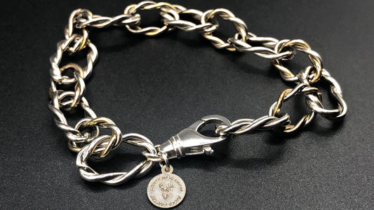 Hand crafted sterling silver and 1/20 14k twisted oval link bracelet