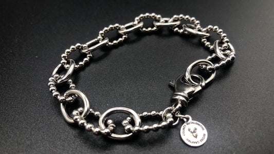 Hand crafted sterling silver oval link bracelet with high polish and beaded links