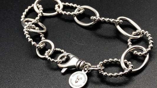 Hand crafted sterling silver high polished and beaded large oval link bracelet