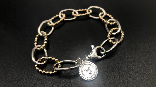 Hand crafted sterling silver high polish and 1/20 gold bead oval link bracelet